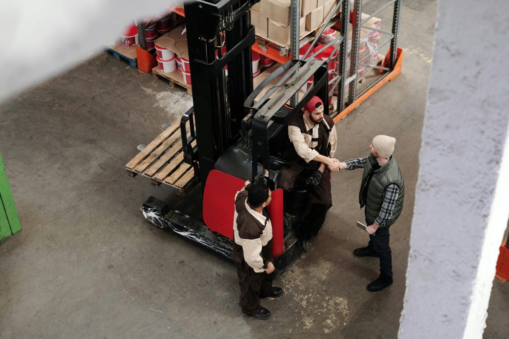 Forklift driver managing inventory