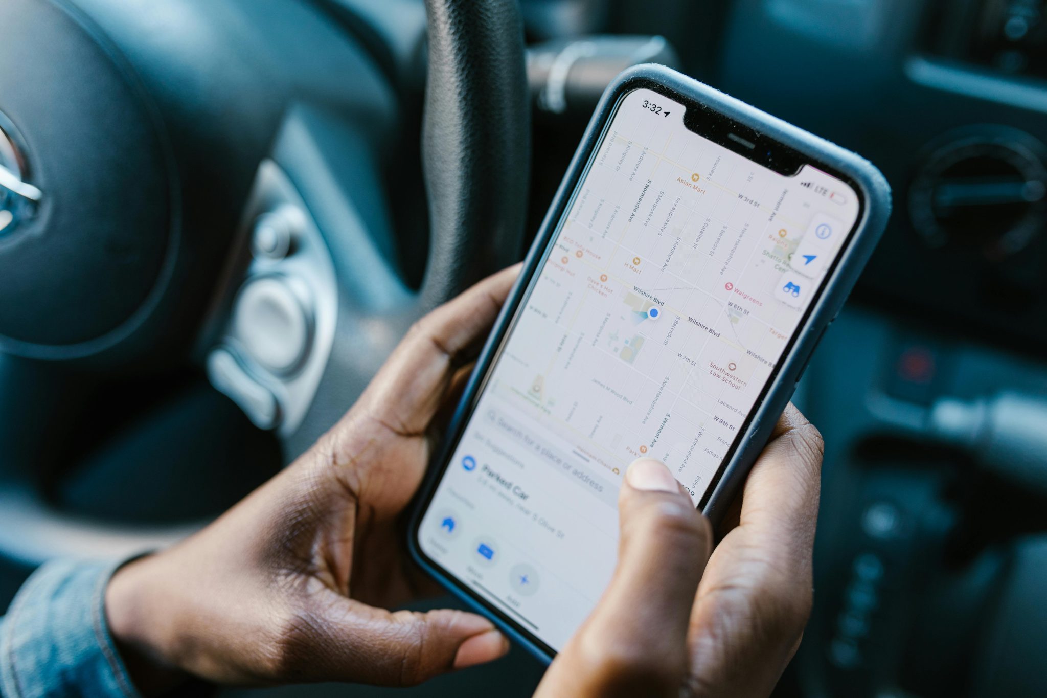Driver getting directions on mobile phone